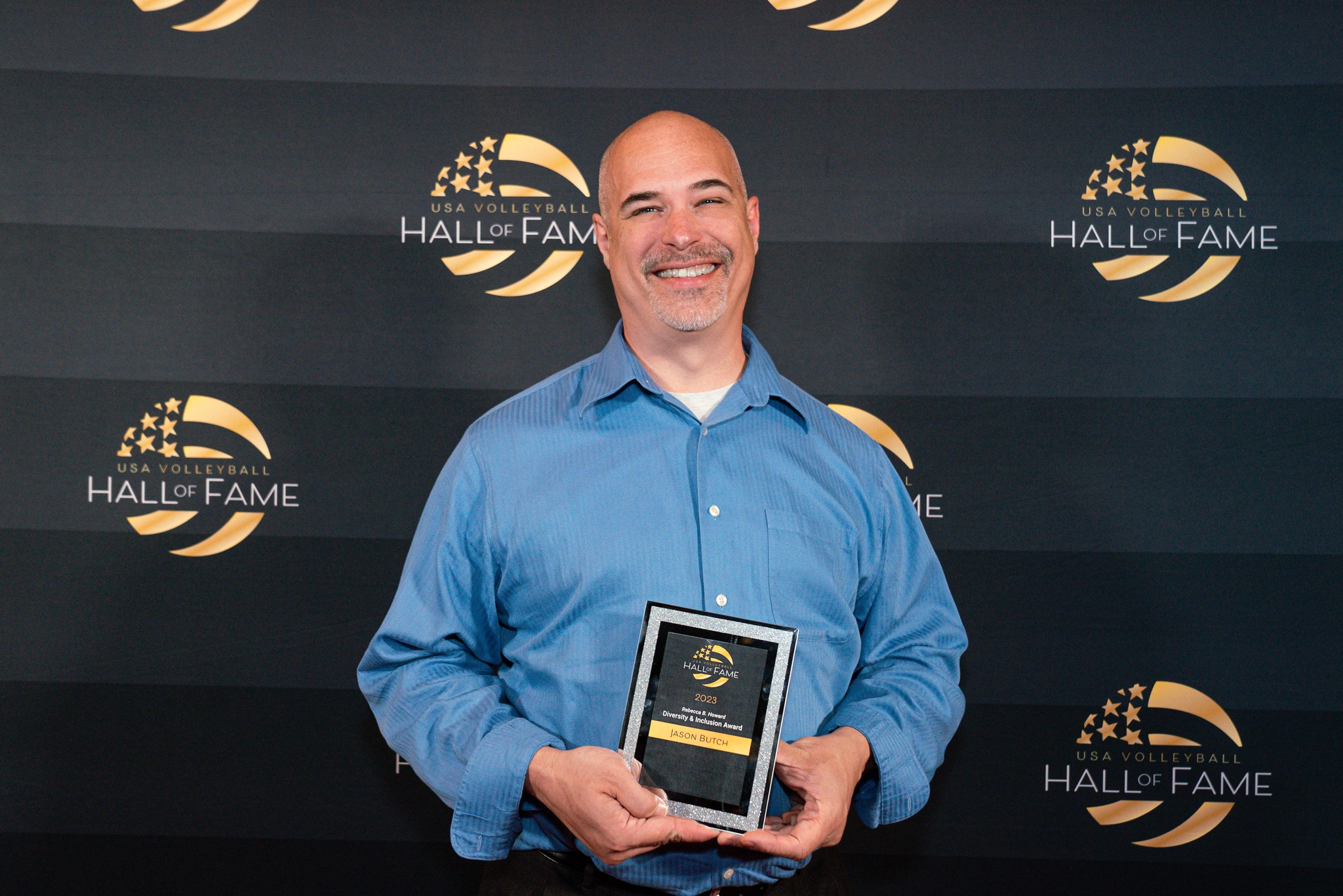 Coach Jason Butch accepts USAV Award